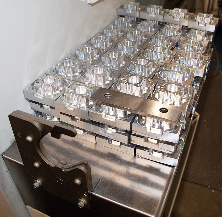 Housings for our LEDs machined in our machine shop.